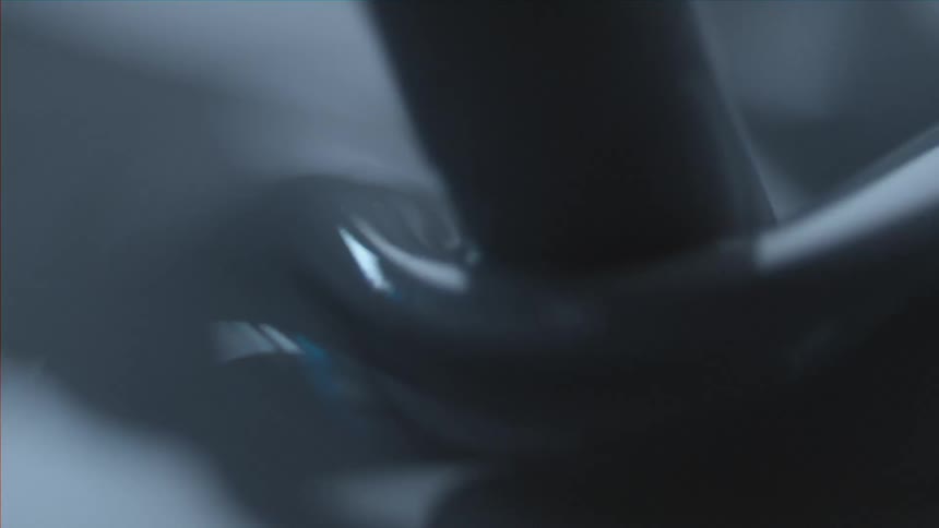 Close up of a thick liquid being stirred
