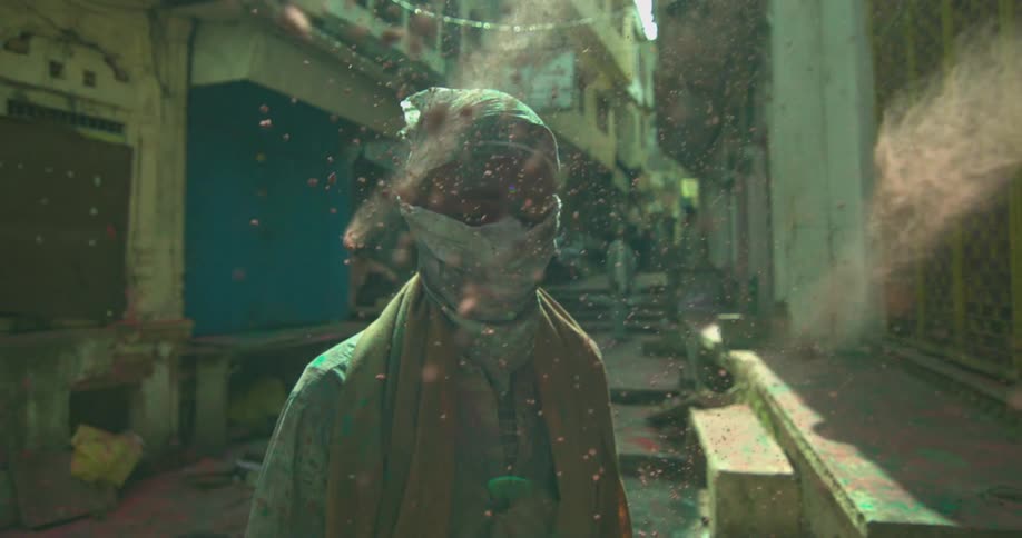 The particles splash over the person
