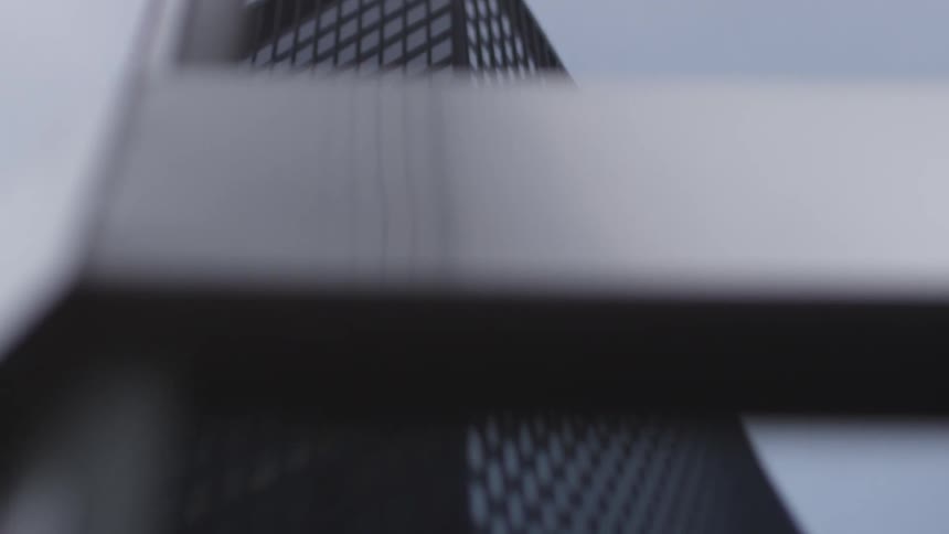 Looking up at tall buildings