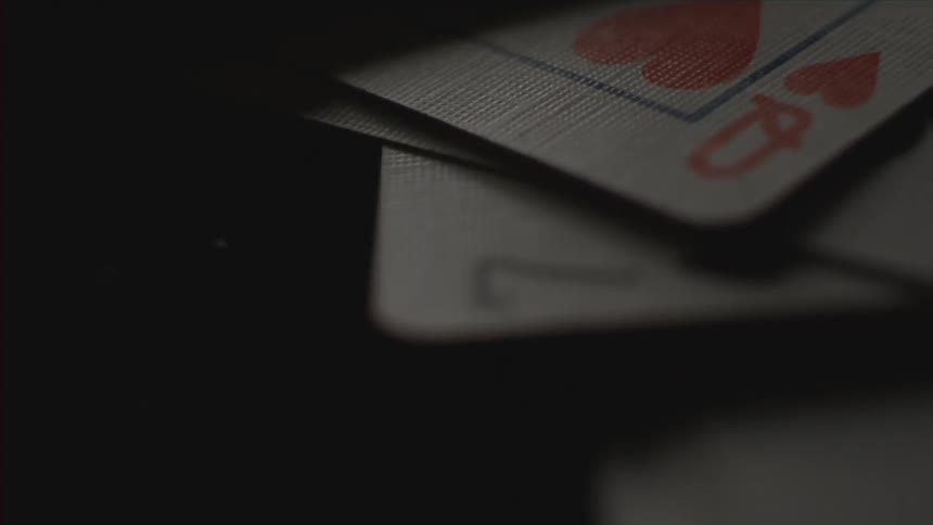 Playing cards sitting on a table