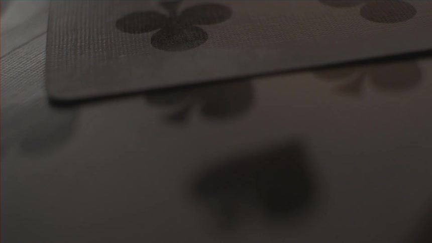 Playing cards are moved