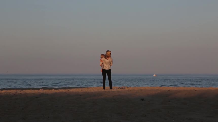A person standing on the beach