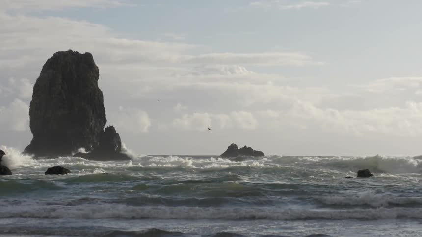 Waves crash on a rocky beach