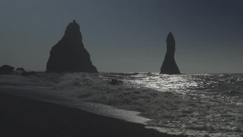 Waves crash on a rocky beach