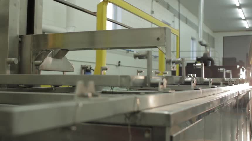 Machinery works inside a factory