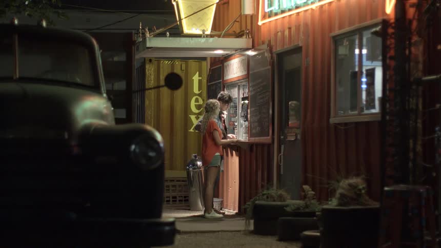 A couple orders food at night