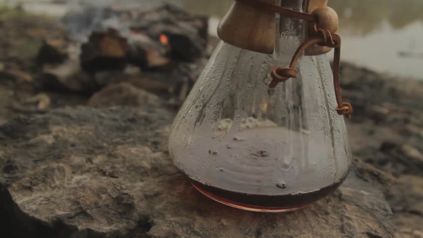 A tea pot near a river