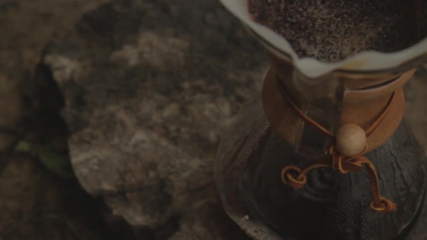 Coffee slowly percolating on a rock