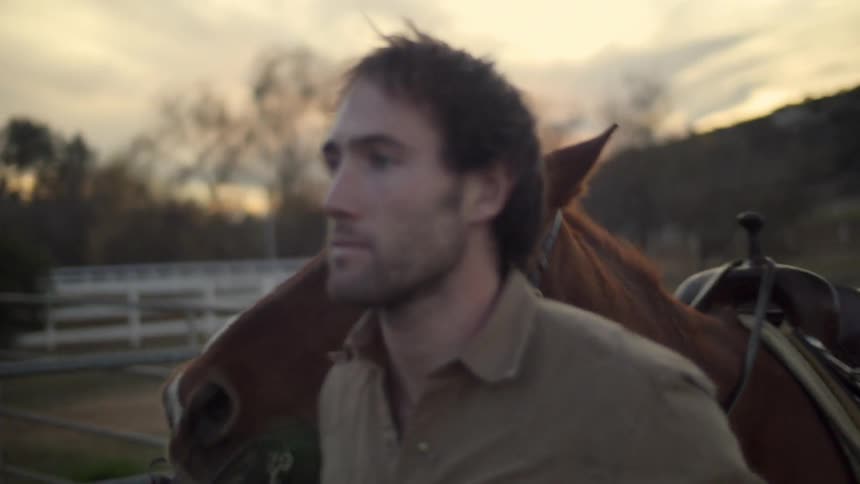 A man leads a horse