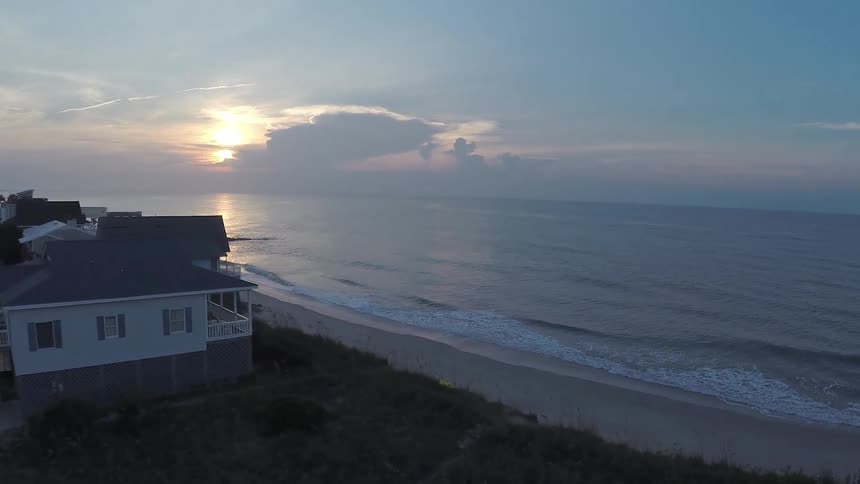 Aerial view of condos next to the beach