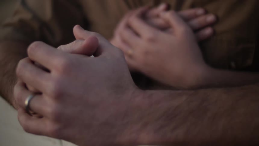 People holding onto each other