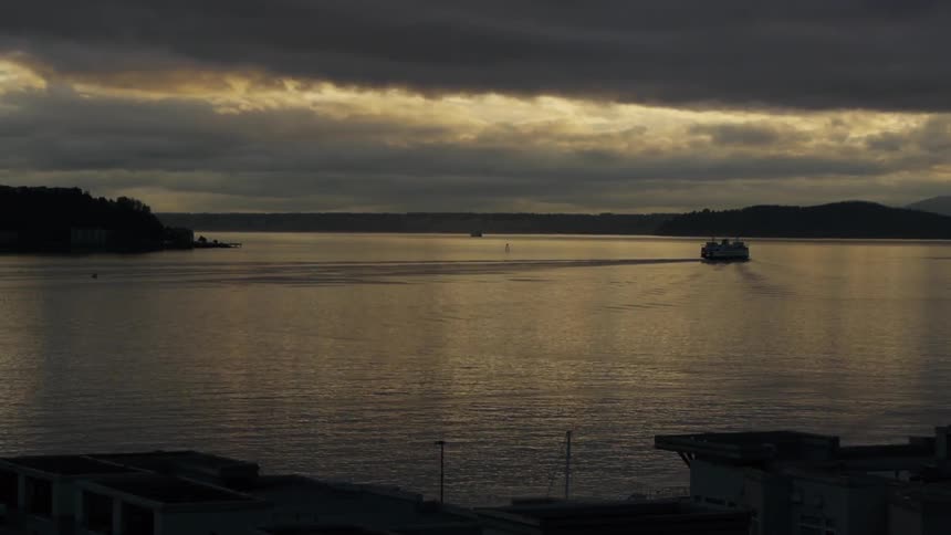 Boat sailing in the lake at sunrise