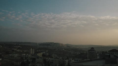 Clouds drifting over a city