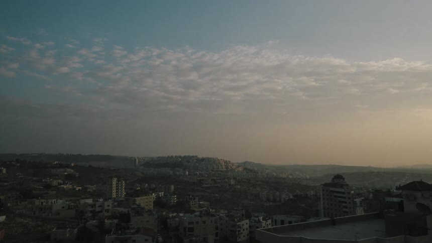 Clouds drifting over a city