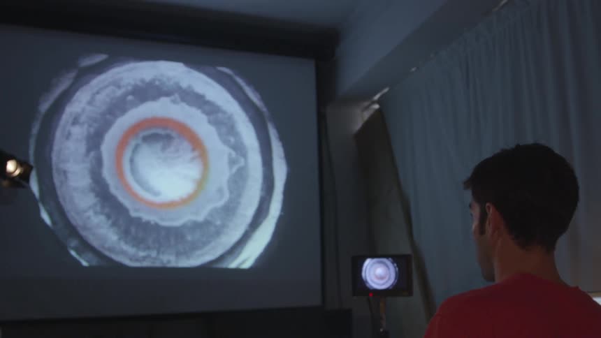 A person watching a screen