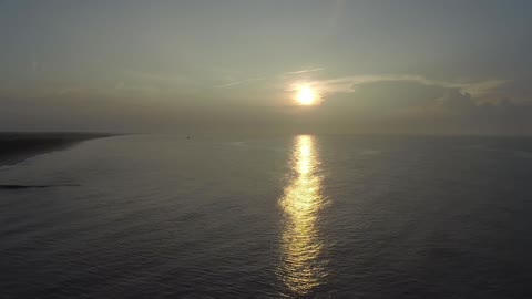 The sun is reflecting off of the water