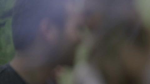 A man and woman kiss