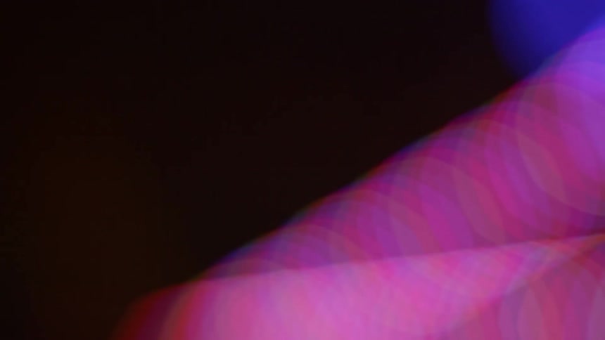 Flashing purple lights on a black background
