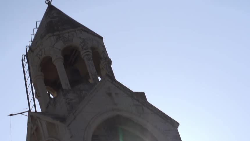 View of a tall church tower on a sunny day