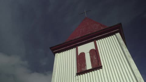 Looking up at a church