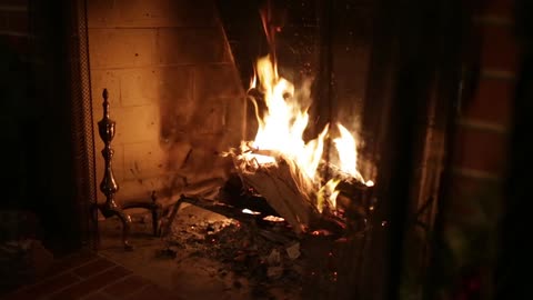 Fire blazing in a home fireplace