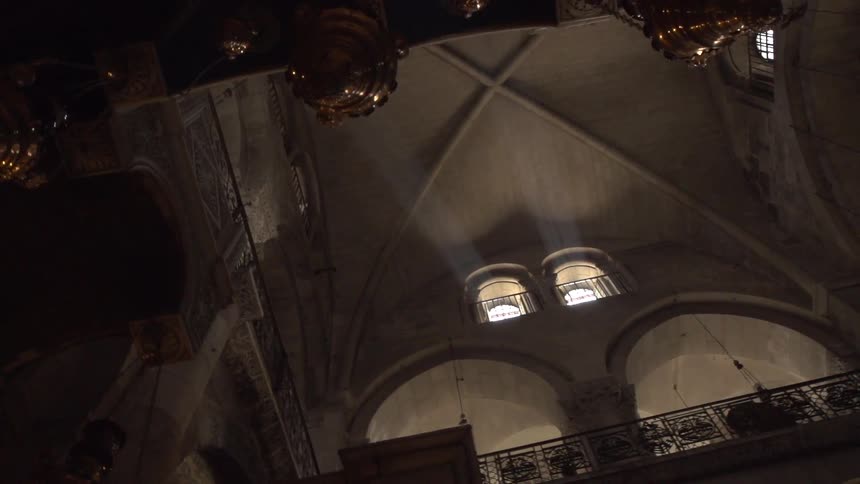Light shines into a cathedral