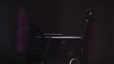 A film reel against a black background