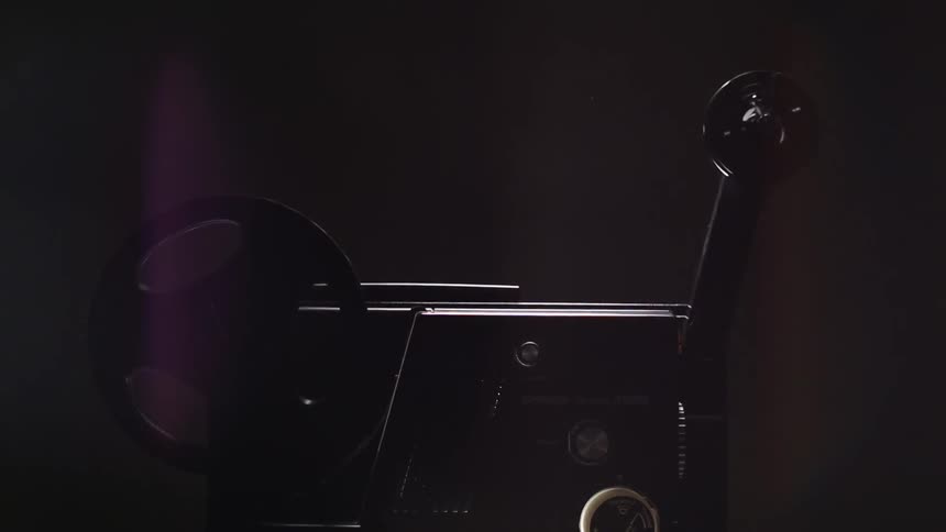 A film reel against a black background