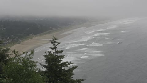 Ocean waves crash onto a sandy beach