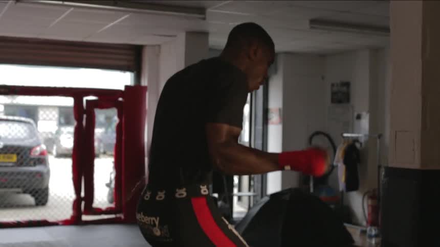 A person jumping rope in a gym