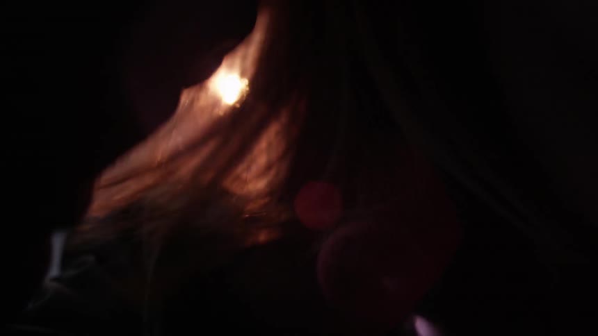 The sun shines on a woman's hair