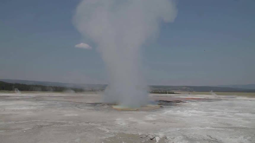 A geyser blowing up steam