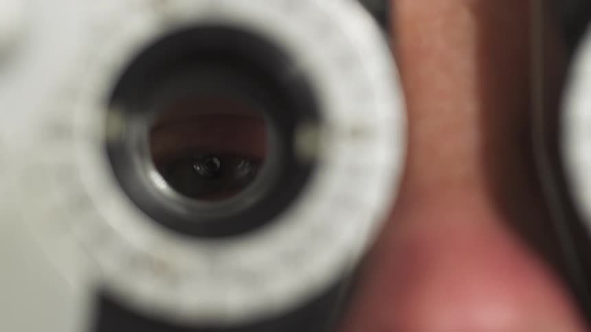 A person receives an eye examination