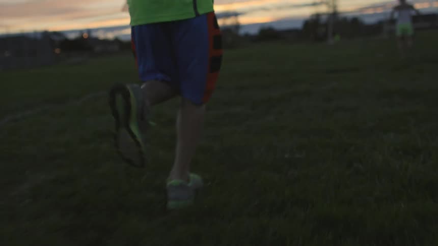 Kids are jogging in a field