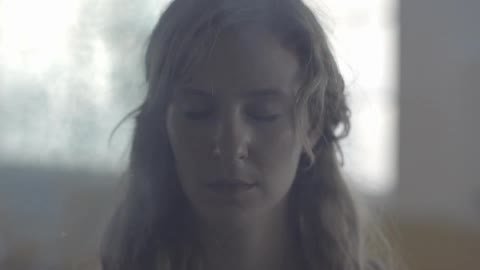 A person surrounded by smoke