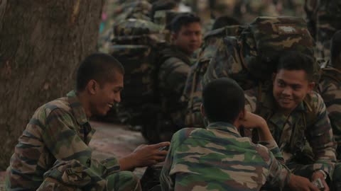 Group of people wearing fatigues
