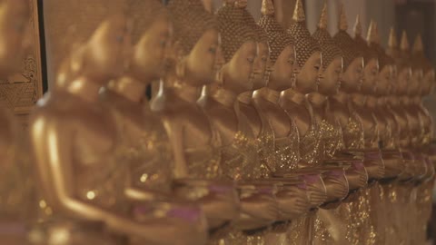 A row of golden buddha statues