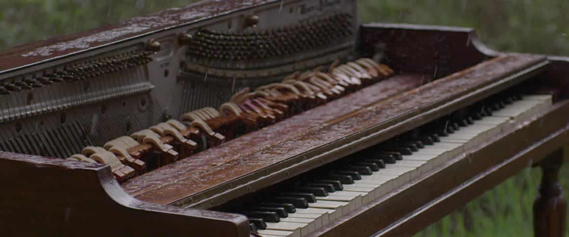 Rain falling on a piano