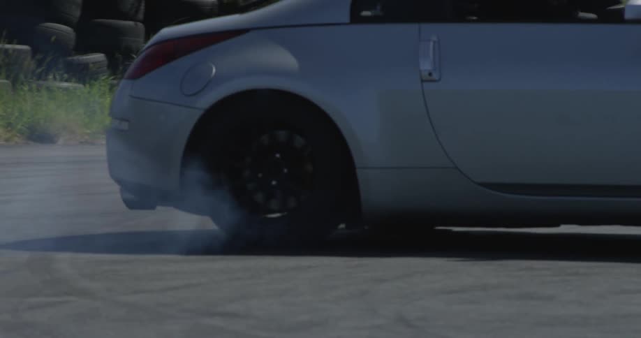 A car spins out in a parking lot