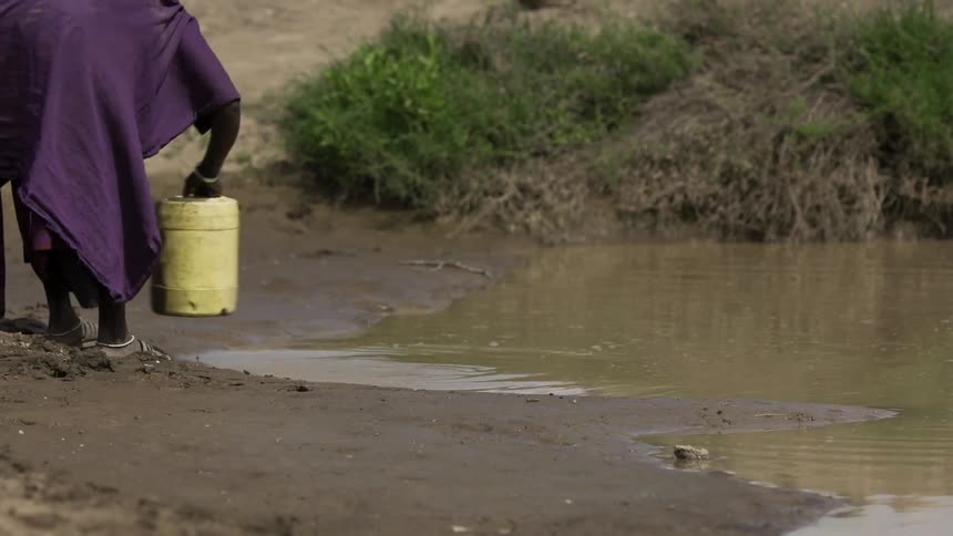 A person collecting water