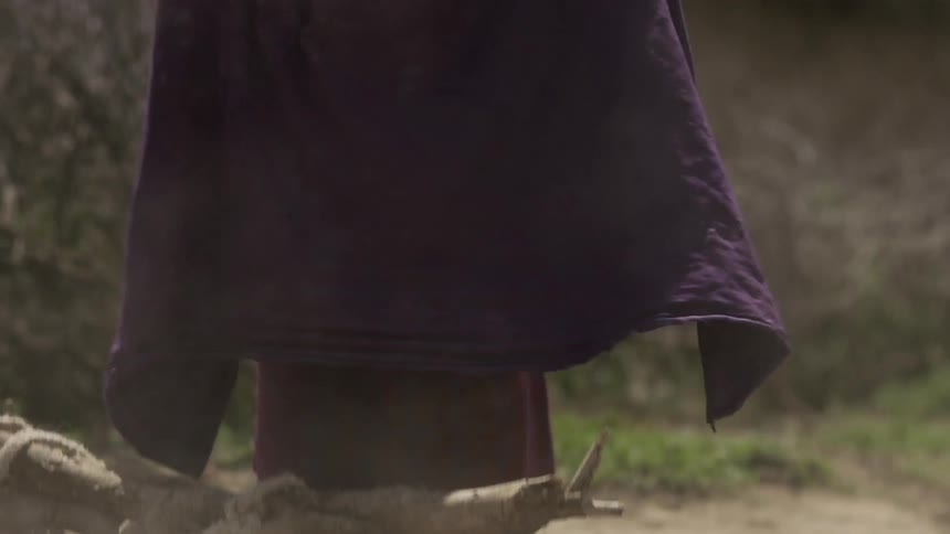 A woman dropped a bunch of firewood