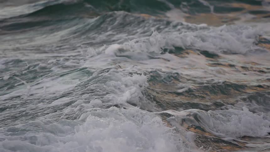 Waves crashing against each other and back out to sea