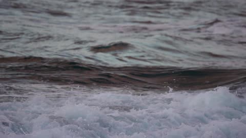 Waves crashing against rocks