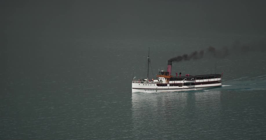 A steamship floats on a body of water
