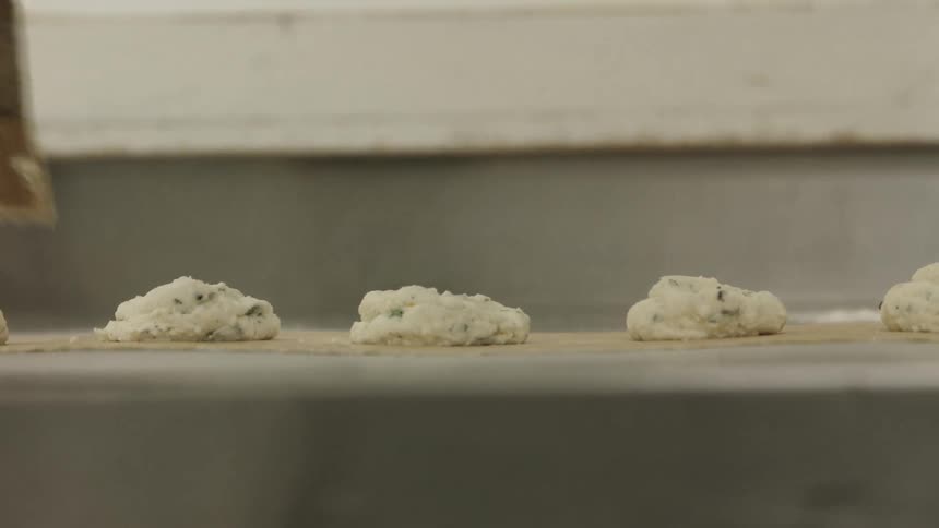 Pastry dough with filling is brushed