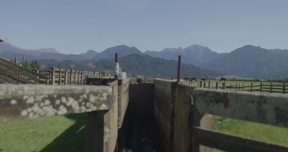 Mountains thru a fence post