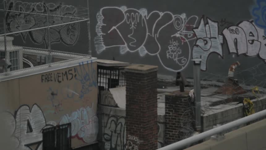Graffiti litters city buildings