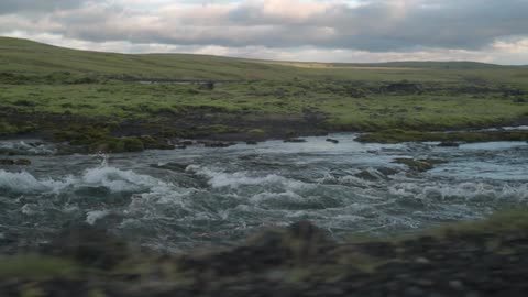 Water rushes down a river