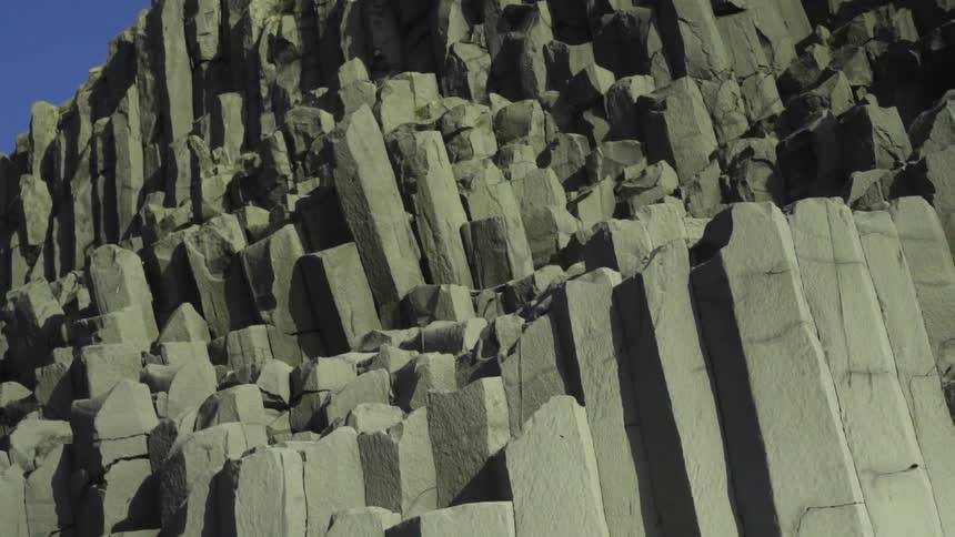 A rocky jagged cliff side