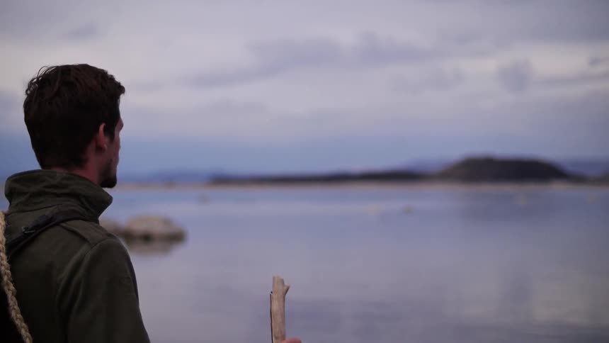 A person staring off at the horizon